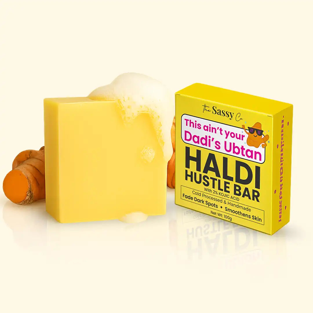 Haldi Hustle Bar soap with packaging on a beige background
