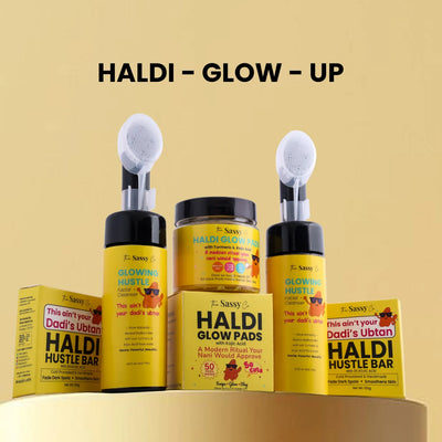 HALDI - GLOW - UP skincare products on a beige background